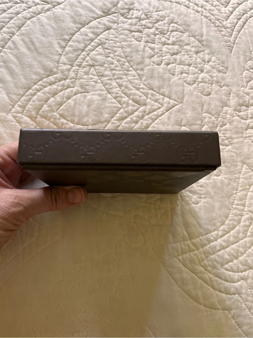 Gucci embossed pattern